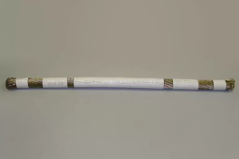 04/07 EST 2 60 White colored wrapper for golden wire.